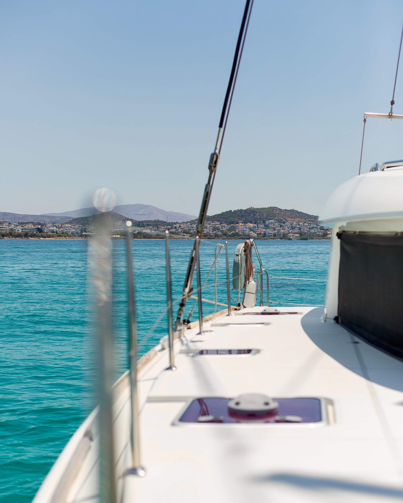 Luxury cruise in the Athenian Riviera. POV from catamaran.